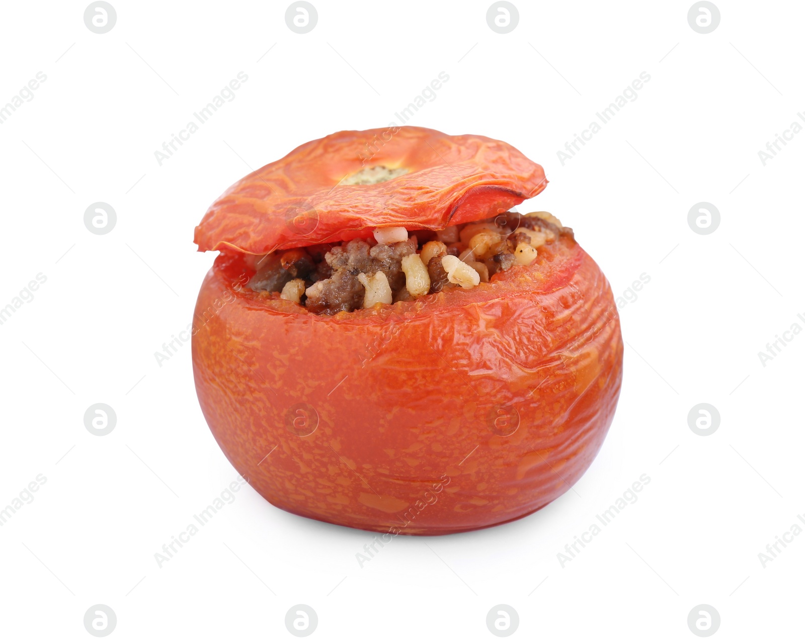 Photo of One delicious stuffed tomato isolated on white