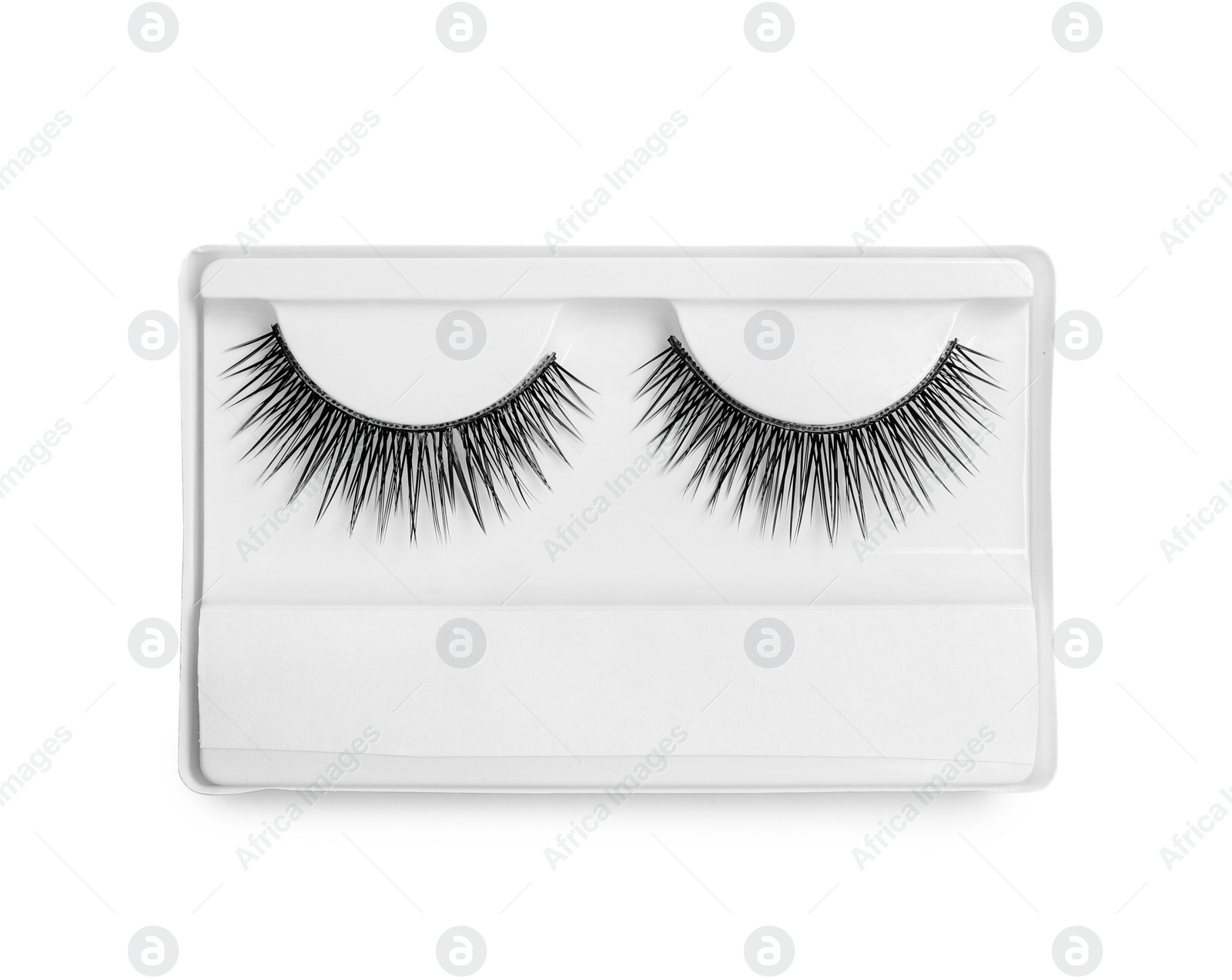 Photo of False eyelashes on white background