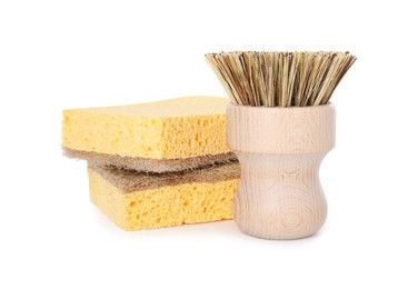 Photo of Cleaning supplies. Brush and sponges isolated on white