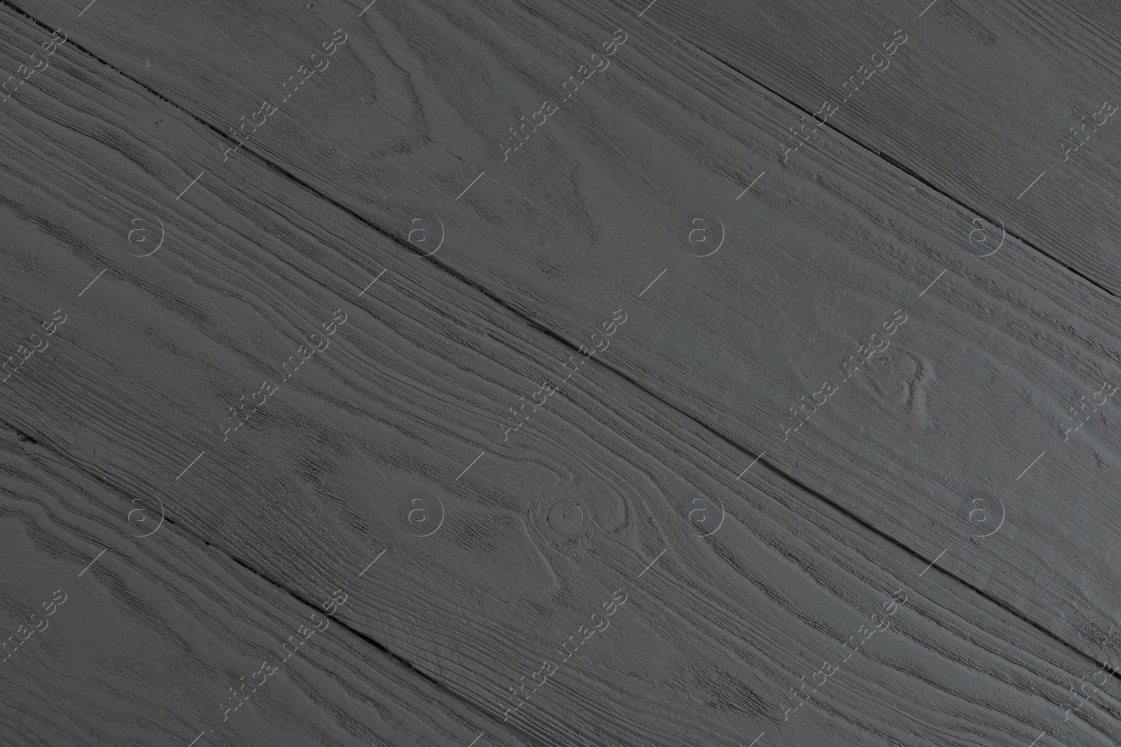 Photo of Texture of grey wooden surface as background, closeup