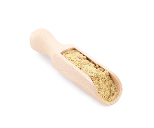 Photo of Wooden scoop with aromatic mustard powder on white background