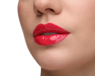 Photo of Woman with bright lip gloss on white background, closeup