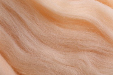 Photo of Soft felting wool as background, closeup view