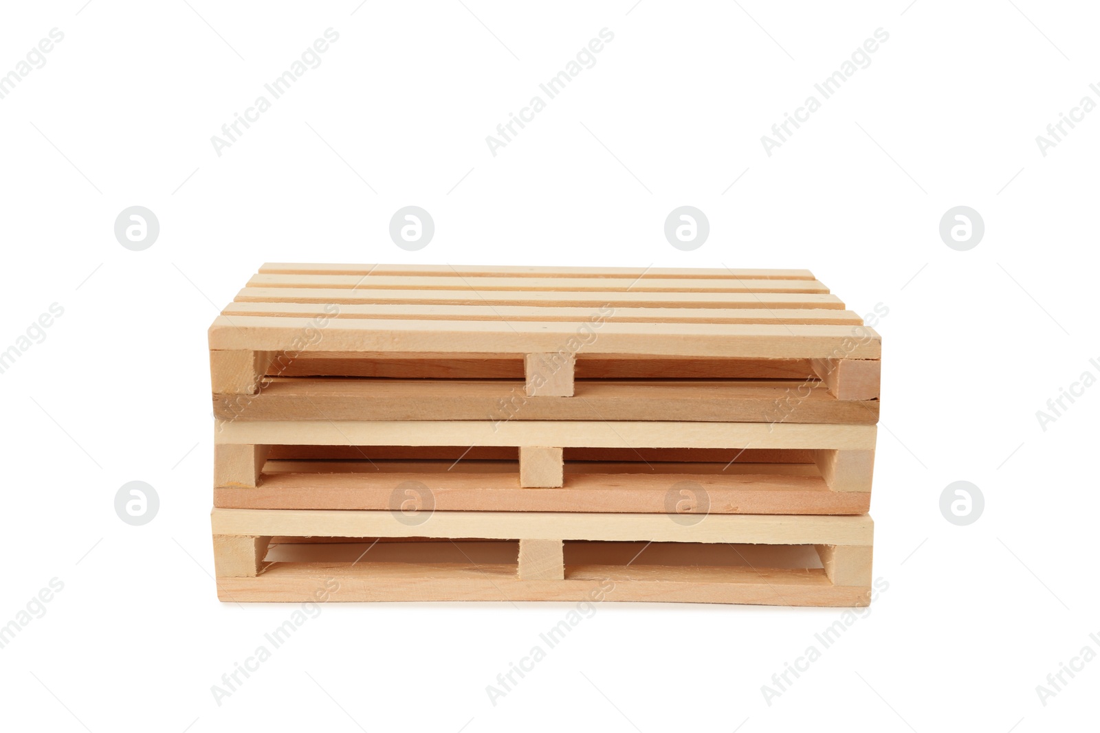 Photo of Stack of small wooden pallets on white background