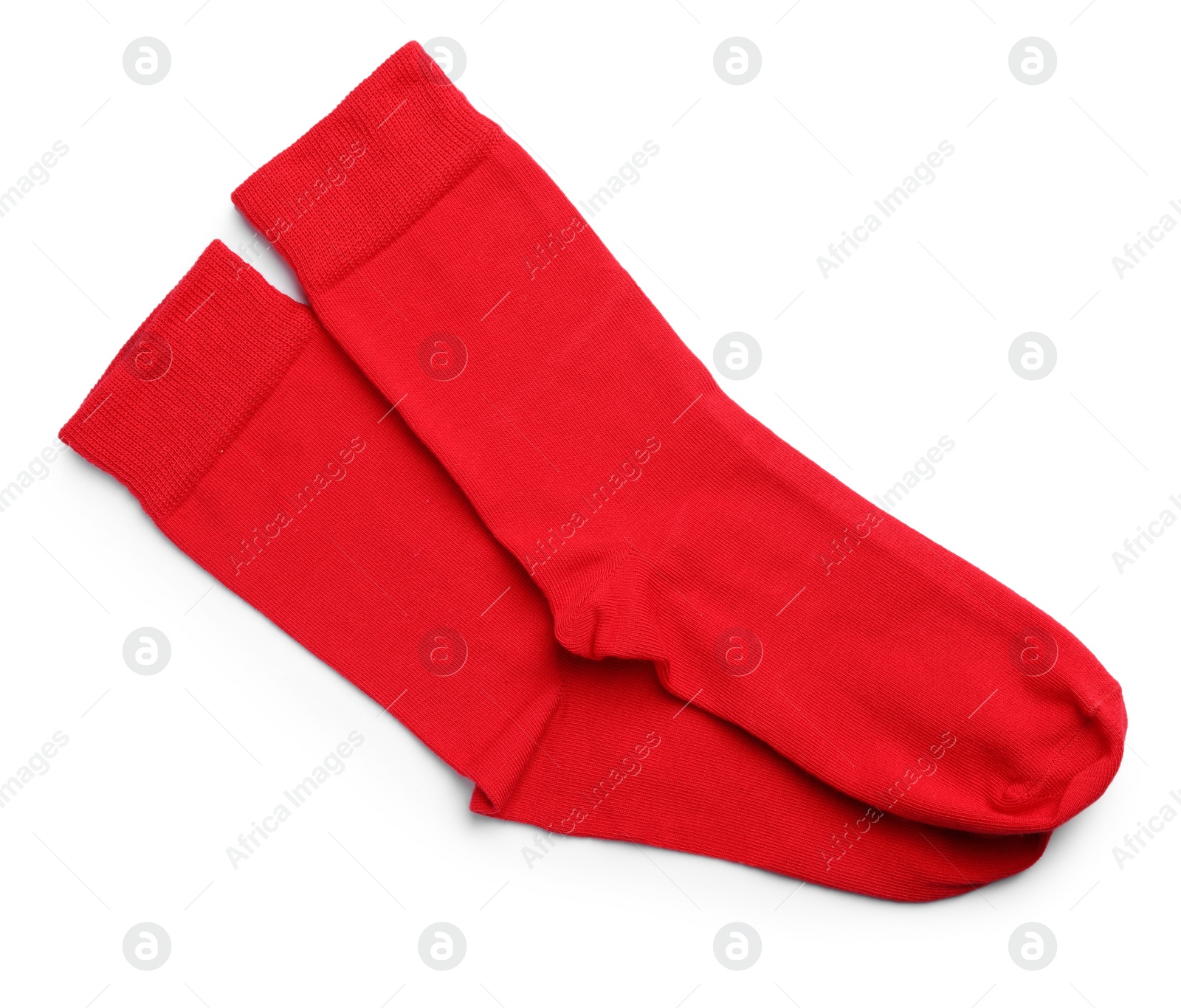 Photo of Pair of red socks on white background, top view