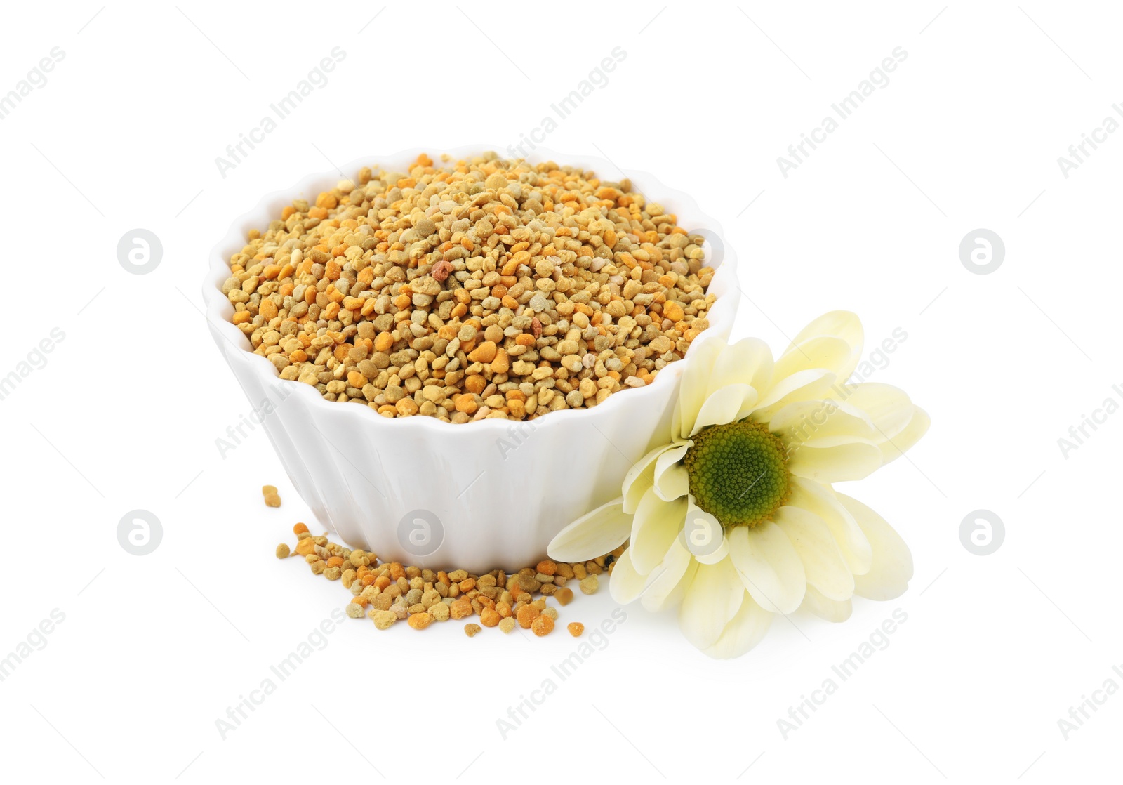 Photo of Fresh bee pollen granules in bowl and flower isolated on white