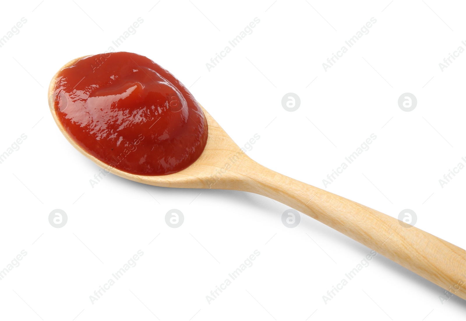 Photo of Tasty ketchup with spoon isolated on white. Tomato sauce