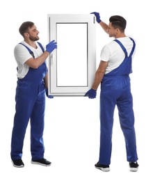 Photo of Workers with plastic window on white background. Installation service