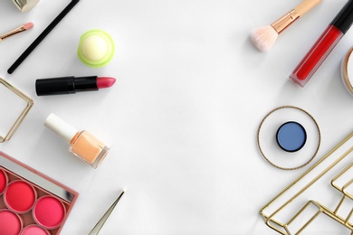 Photo of Flat lay composition with makeup products for woman on light background