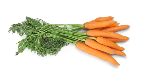 Photo of Ripe carrots on white background. Healthy diet