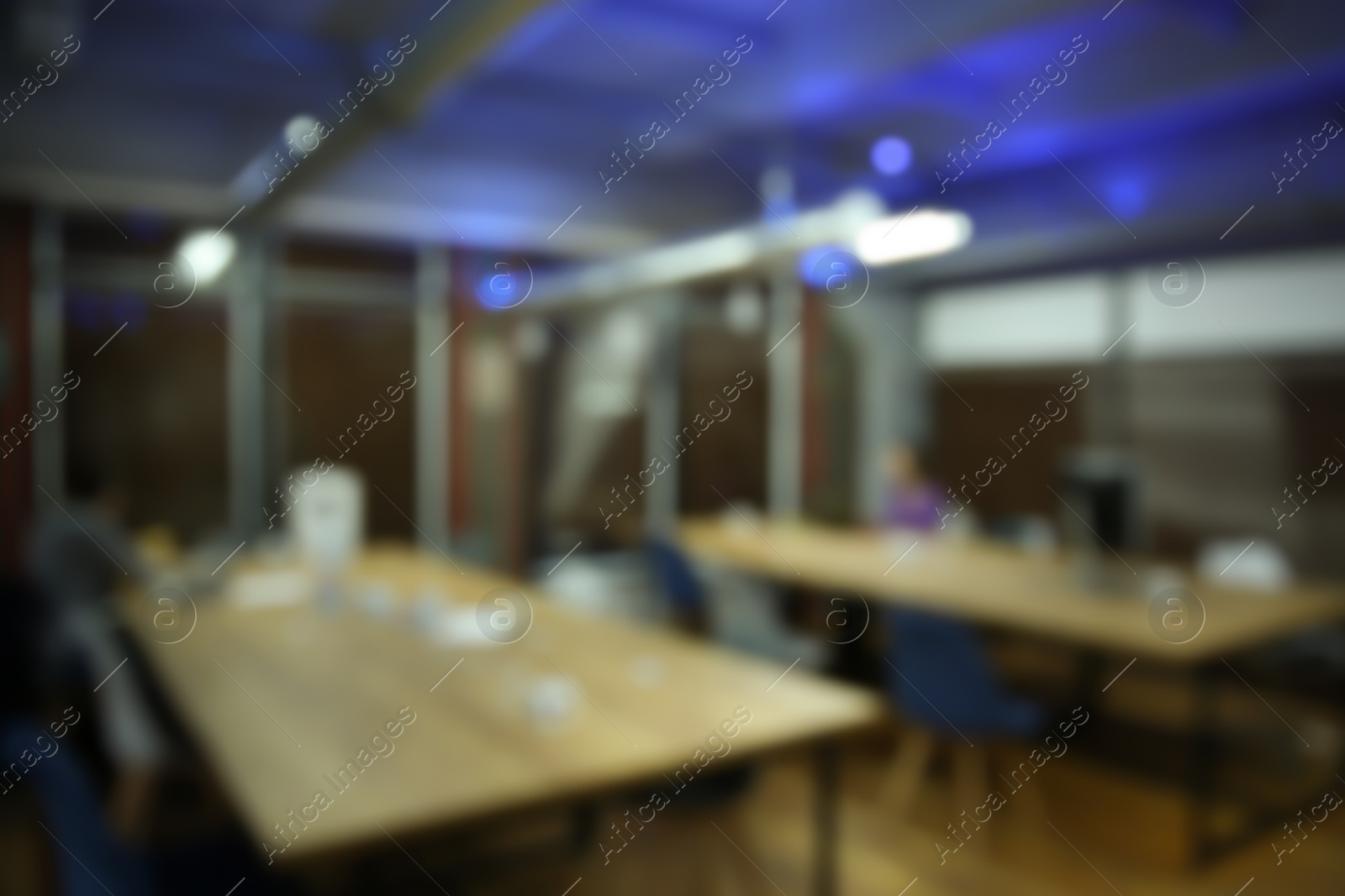 Photo of Blurred view of modern comfortable office interior