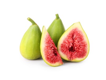 Photo of Cut and whole fresh green figs isolated on white