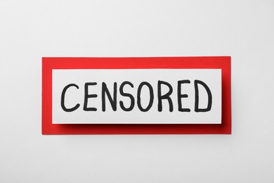 Photo of Card with word Censored on white background, top view