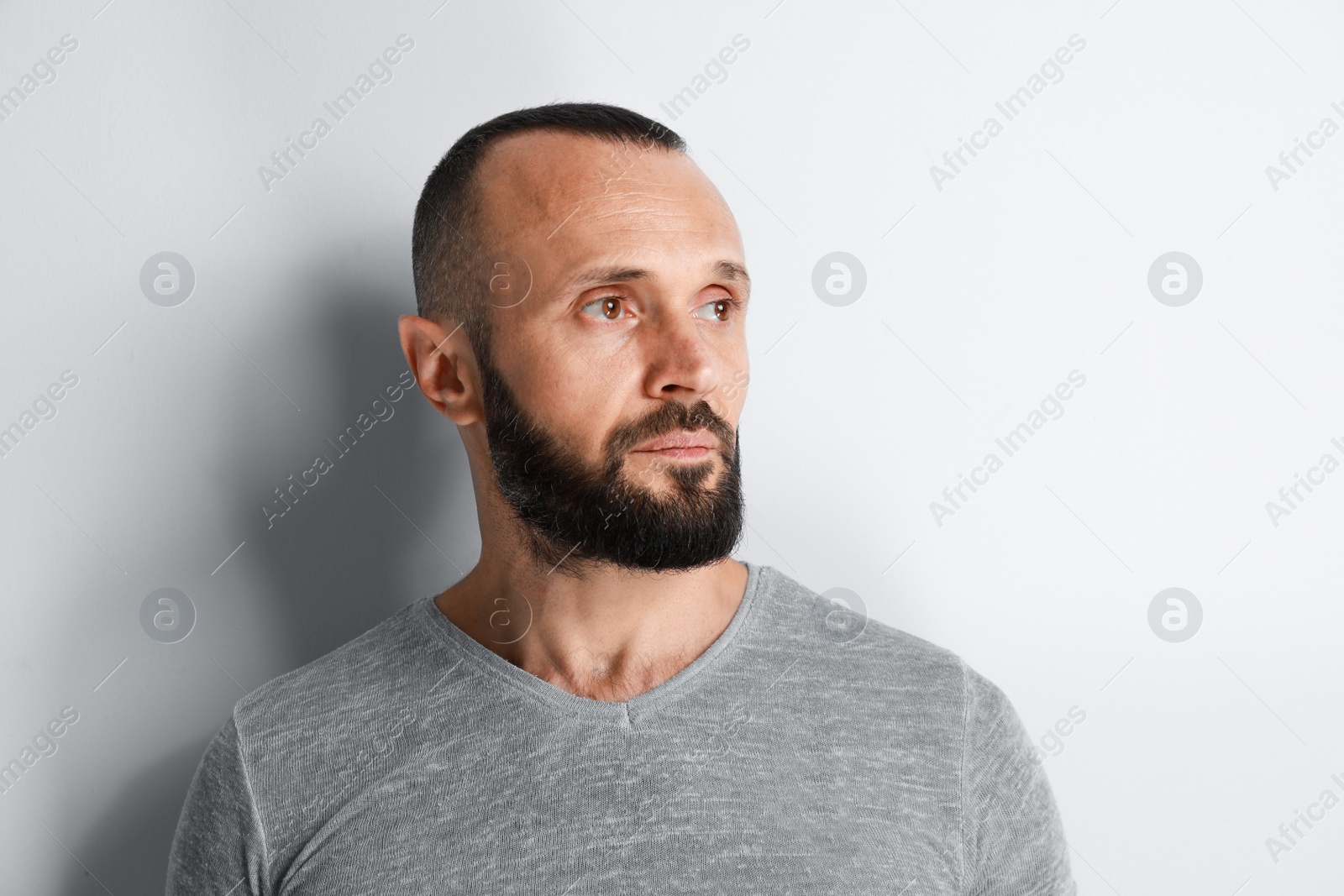 Photo of Portrait of handsome man on white background