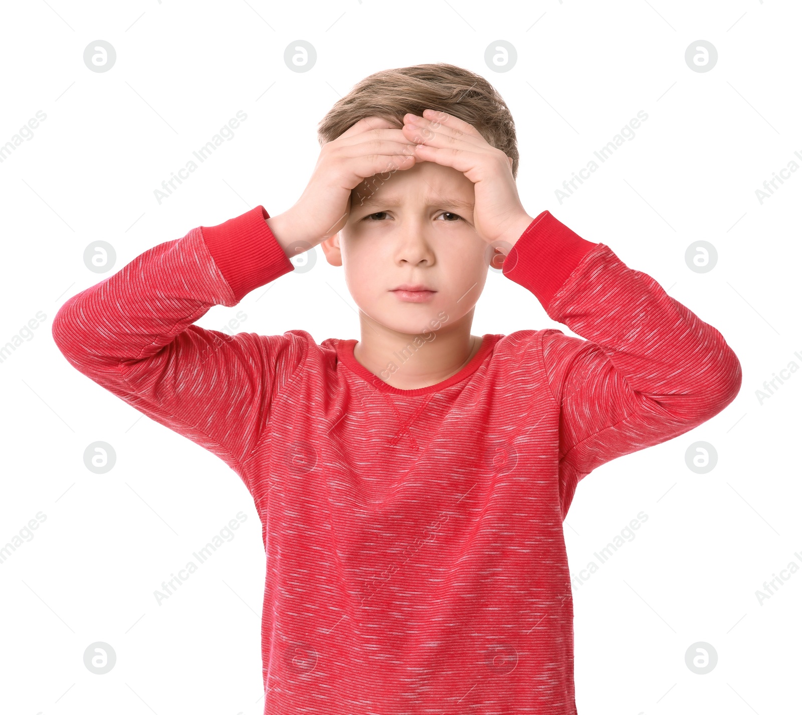 Photo of Little boy suffering from headache on white background