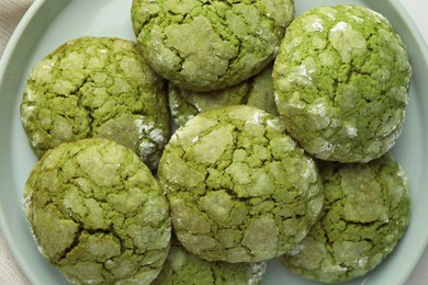 Plate with tasty matcha cookies, top view