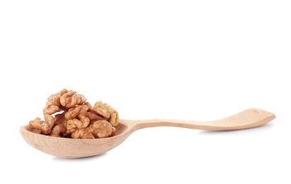 Wooden spoon with tasty walnuts on white background