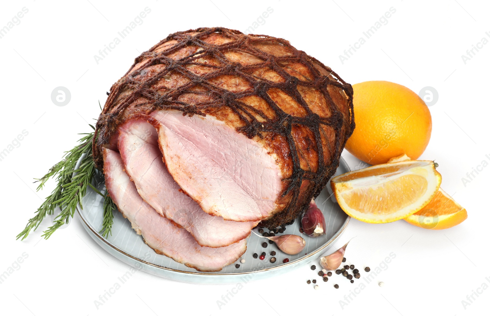 Photo of Delicious baked ham, orange, garlic and rosemary isolated on white