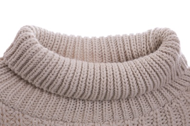 Cozy warm sweater on white background, closeup