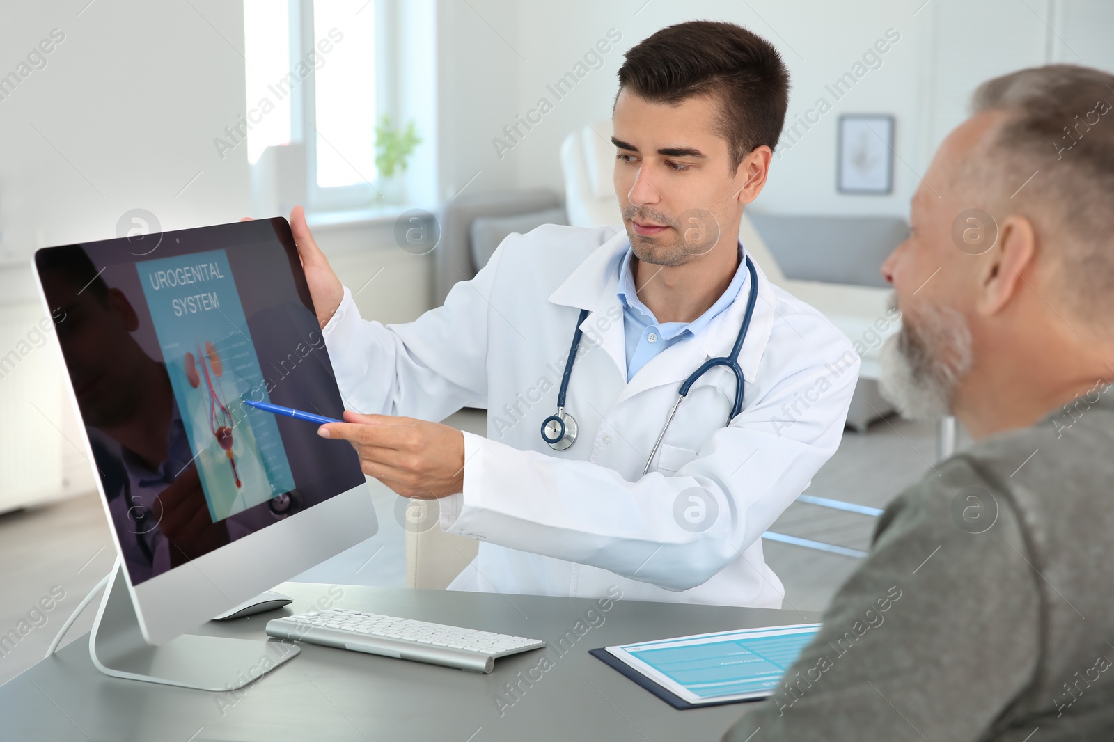 Photo of Man with health problem visiting urologist at hospital