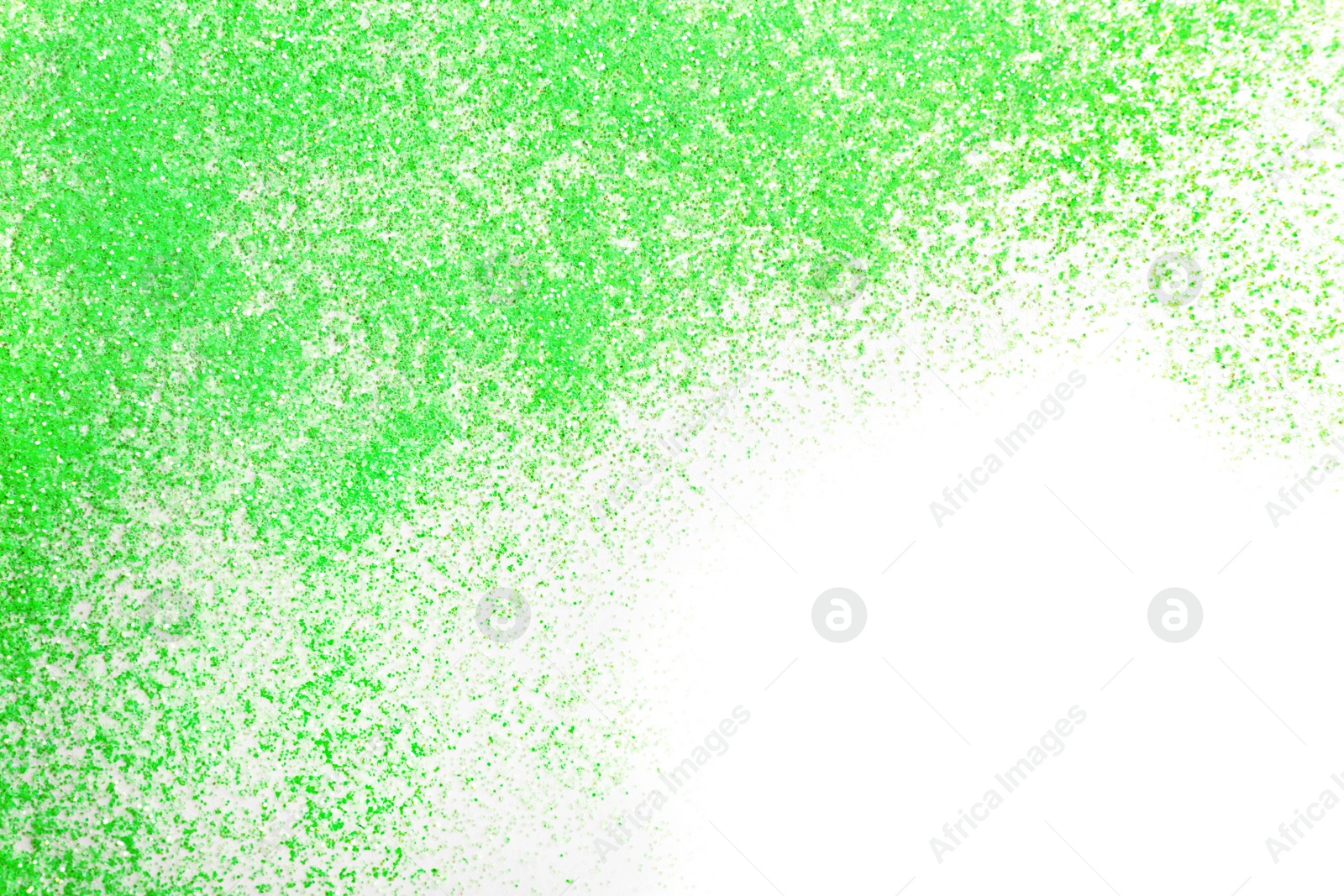 Photo of Green glitter on white background, top view