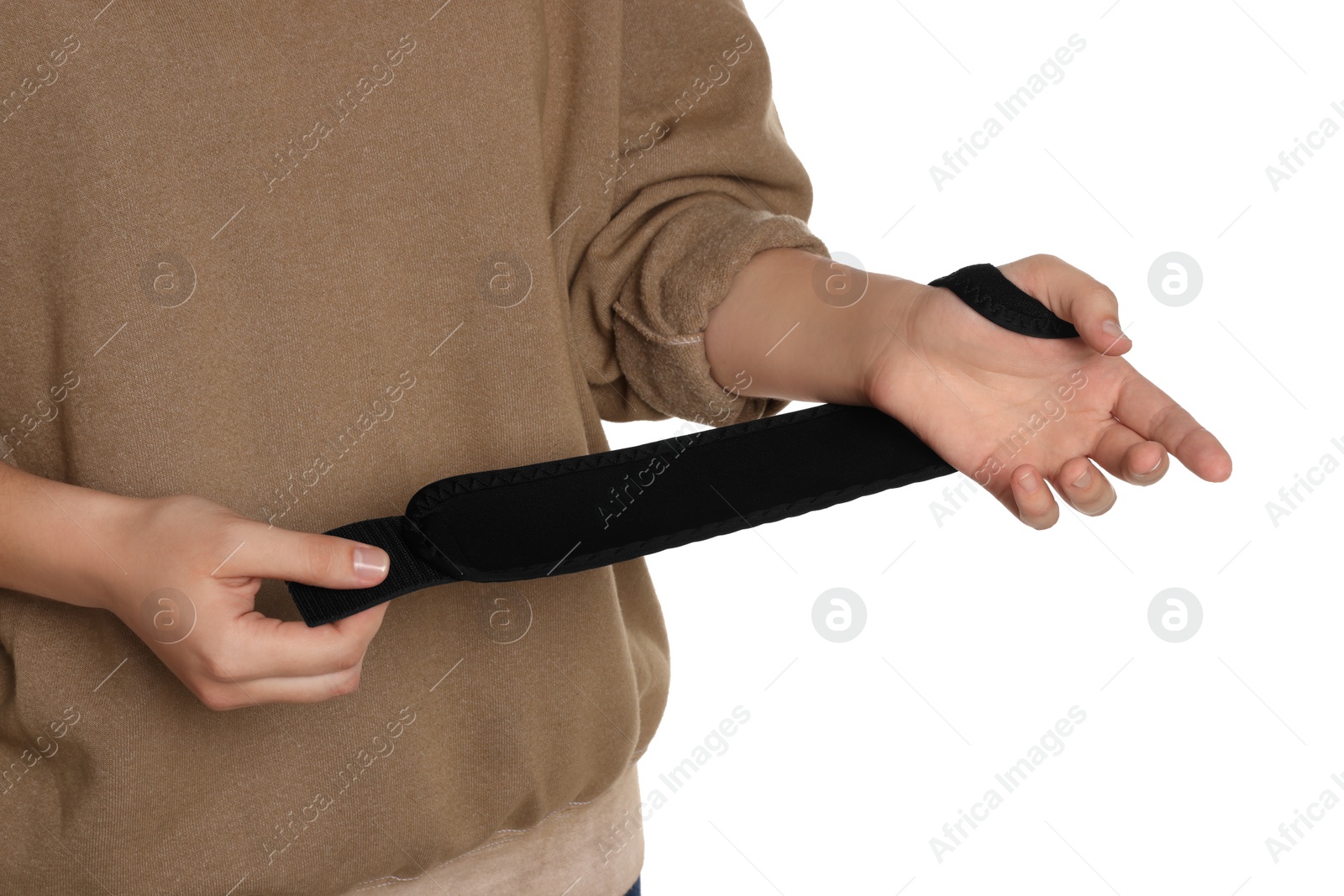 Photo of Woman wrapping hand in medical bandage on white background, closeup