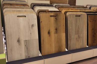 Photo of Many different samples of wooden flooring in store