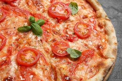 Delicious pizza Margherita on table, closeup view