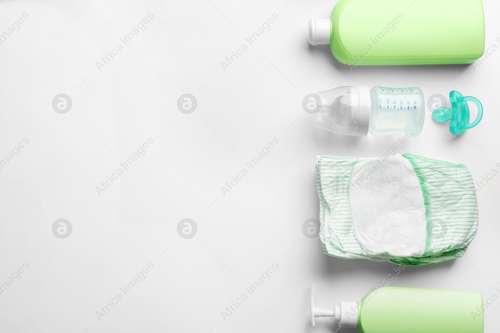 Photo of Flat lay composition with baby accessories and space for text on white background