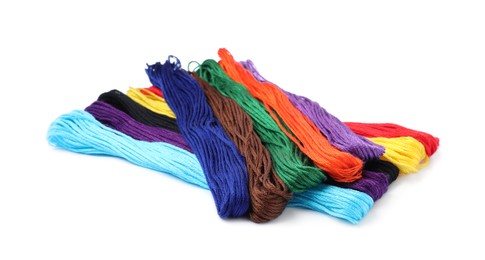 Photo of Set of colorful embroidery threads on white background