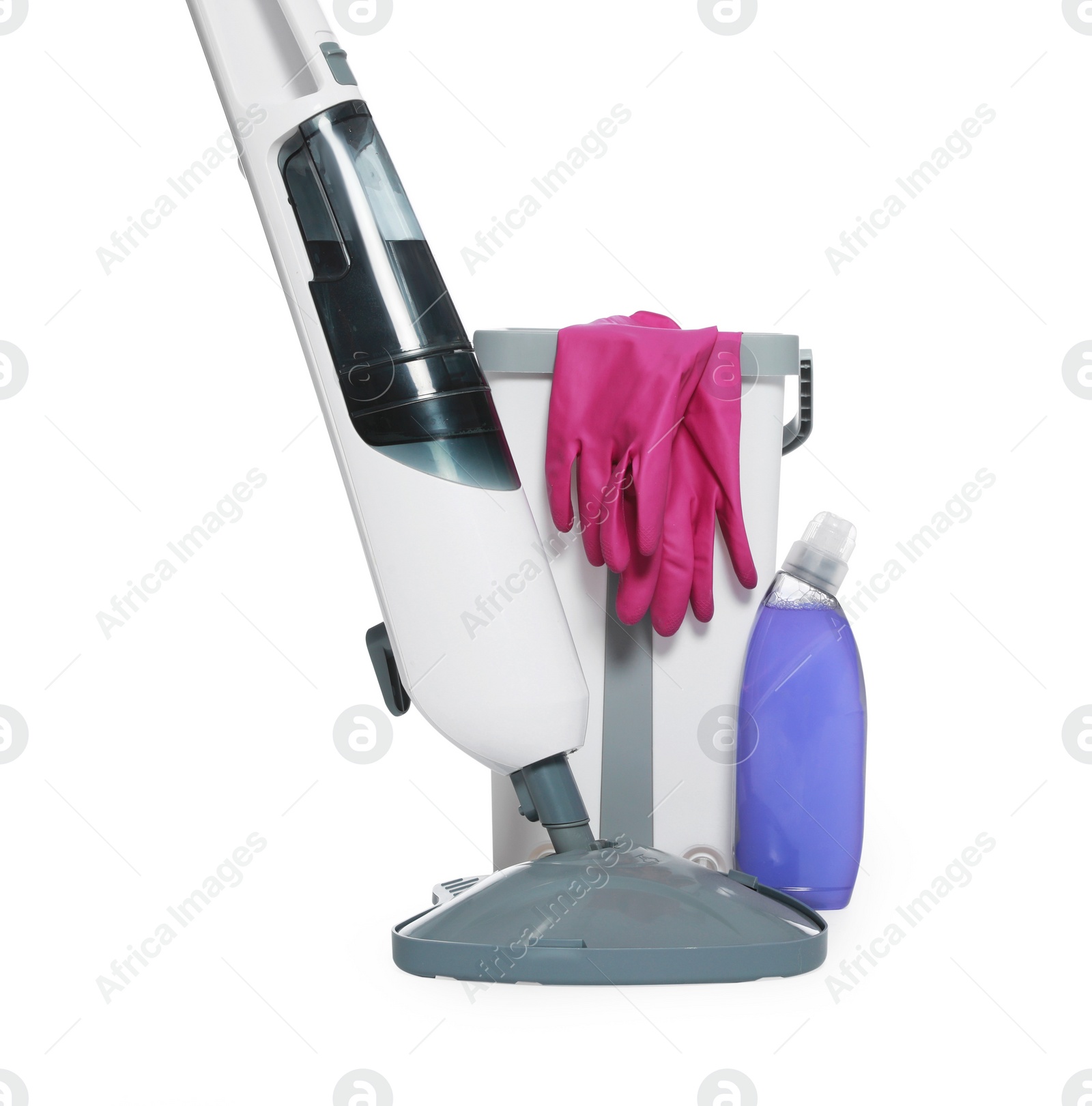 Photo of Modern steam mop, bucket with gloves and bottle of cleaning product isolated on white