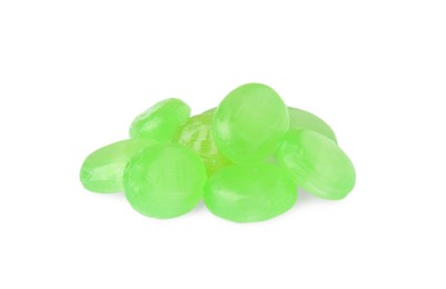 Photo of Many light green cough drops on white background