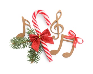 Photo of Composition with wooden music notes on white background, top view. Christmas celebration