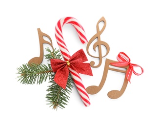 Composition with wooden music notes on white background, top view. Christmas celebration