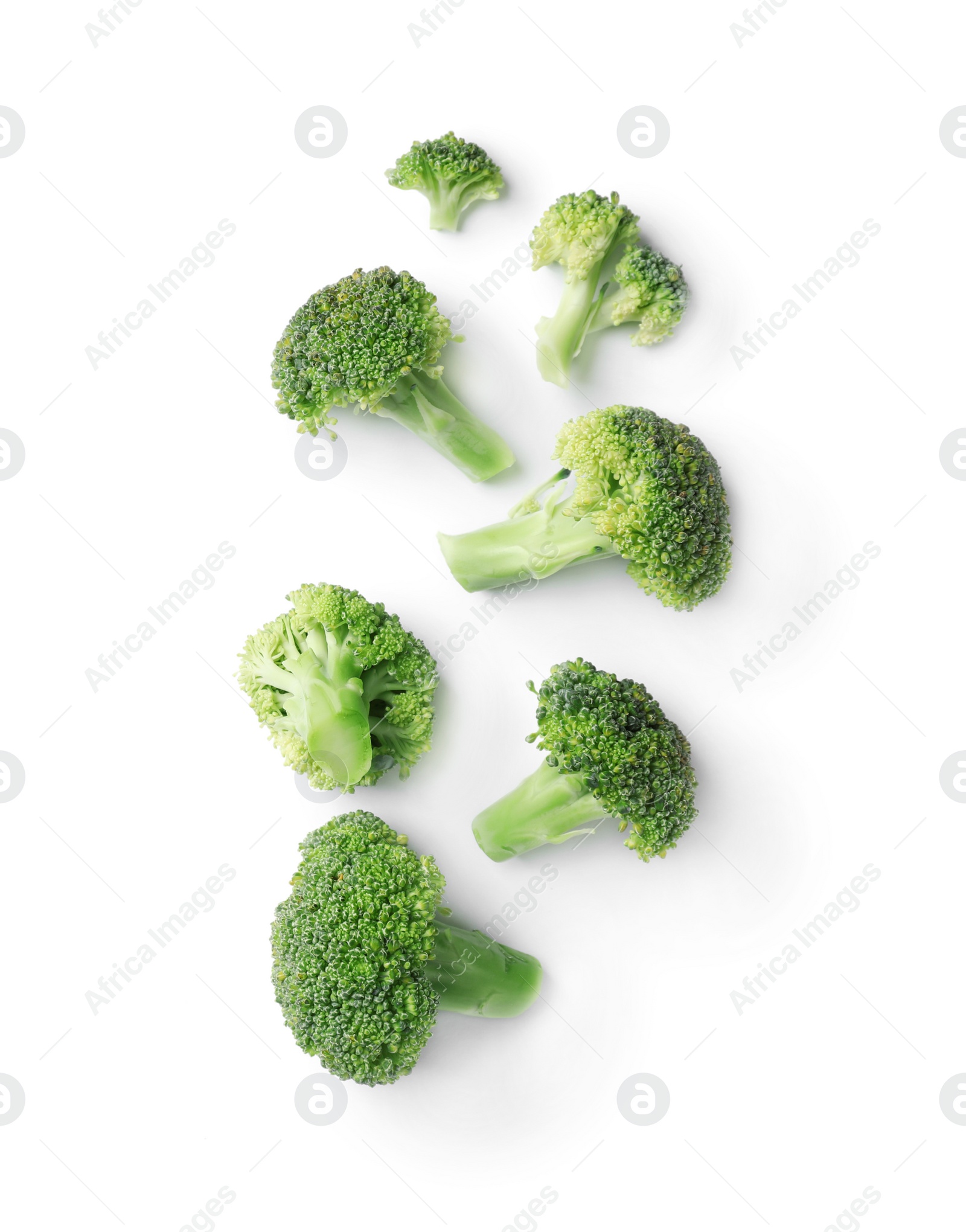 Photo of Flat lay composition with fresh green broccoli on light background