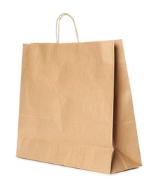 Photo of Paper shopping bag isolated on white. Mock up for design