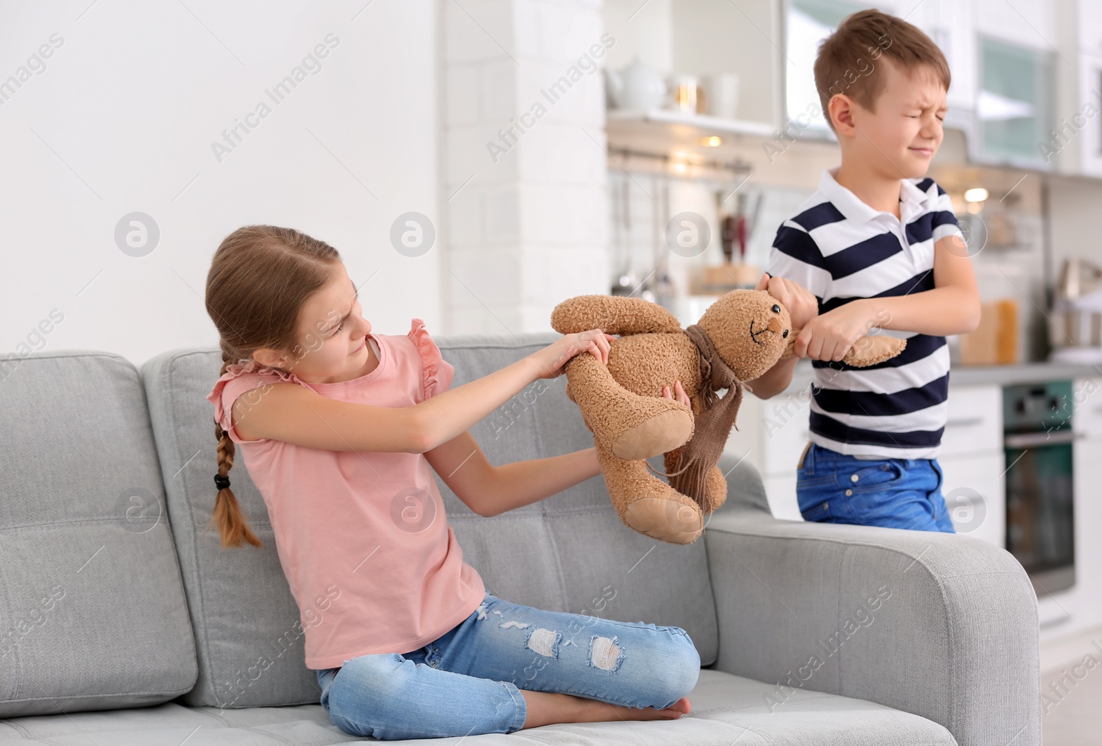 Photo of Brother arguing with sister at home