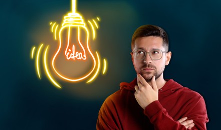 Idea generation. Thoughtful man and illustration of glowing light bulb on dark background
