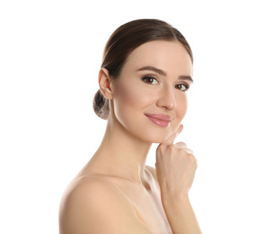 Portrait of young woman with beautiful face on white background