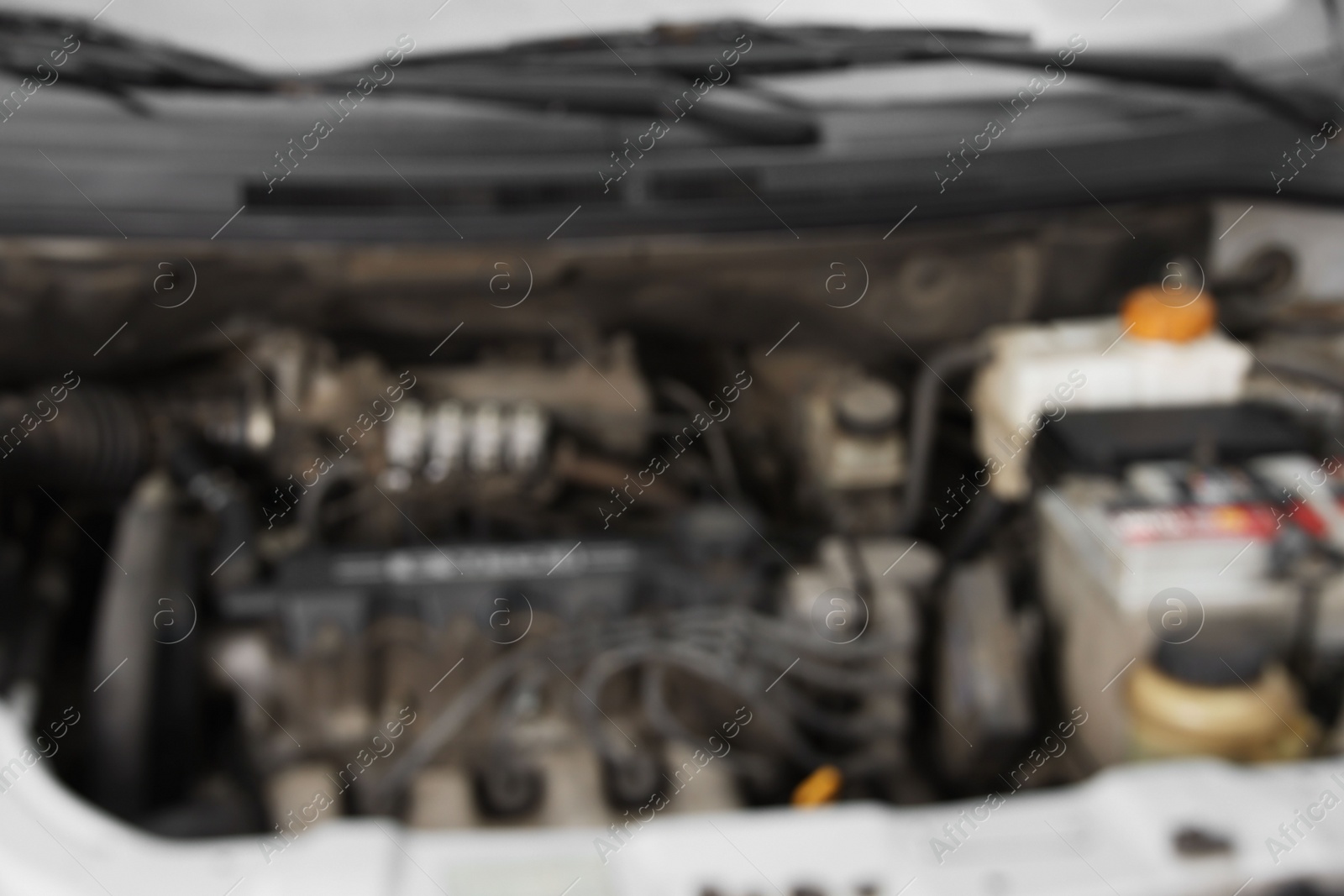 Photo of Blurred view of engine bay in modern car