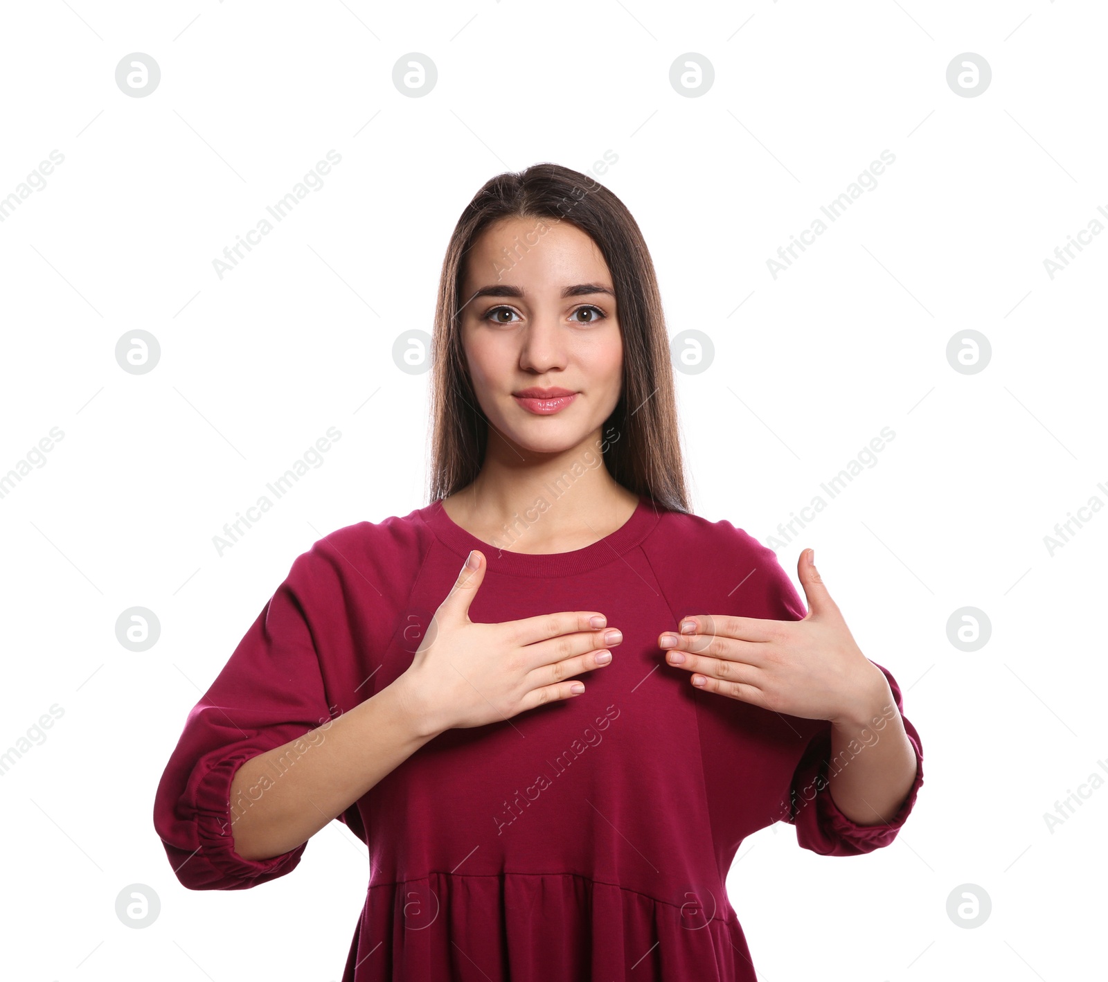 Photo of Woman showing word HAPPY in sign language on white background