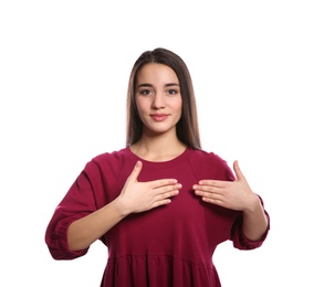Woman showing word HAPPY in sign language on white background