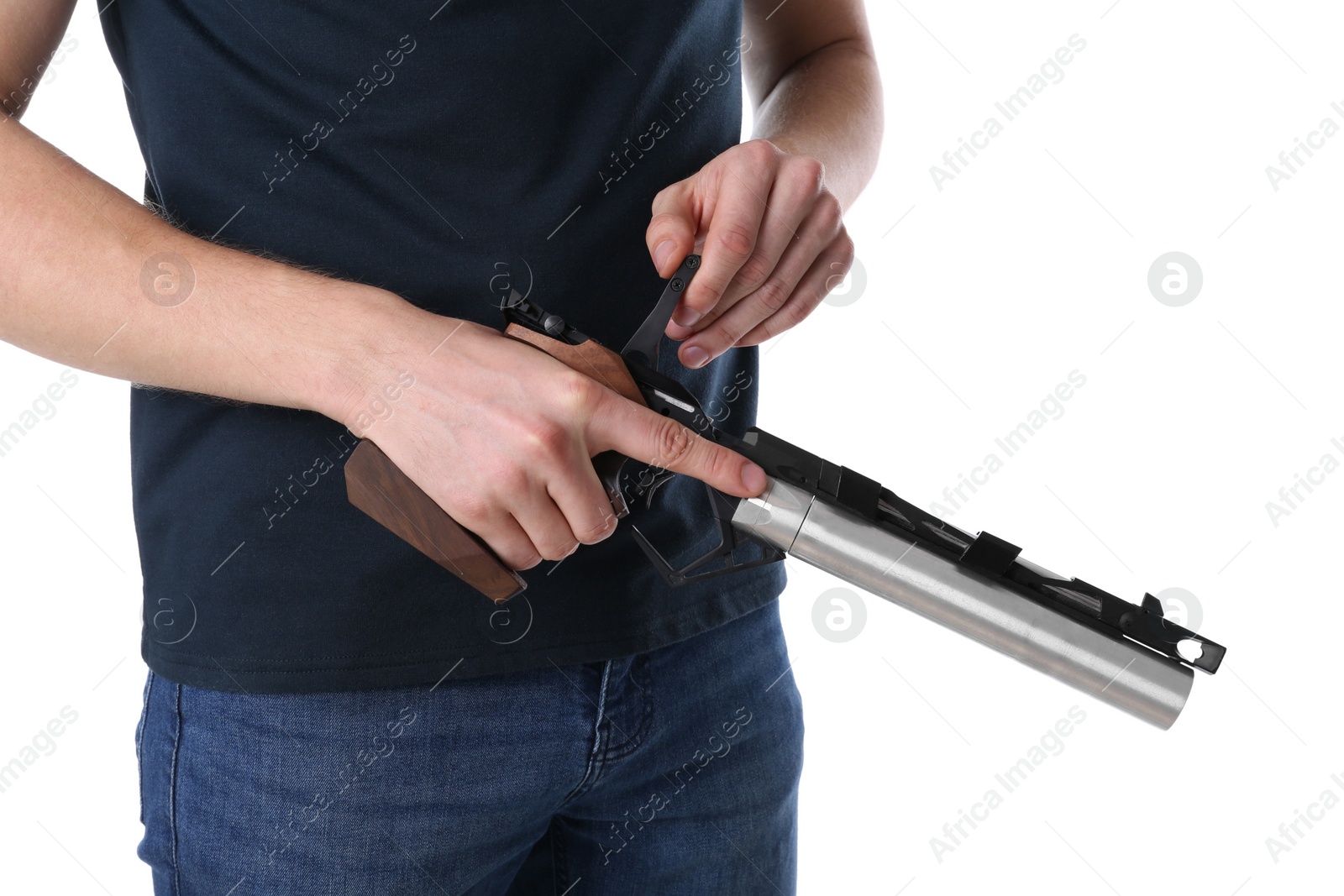 Photo of Gun shooting sport. Man holding standard pistol on white background, closeup