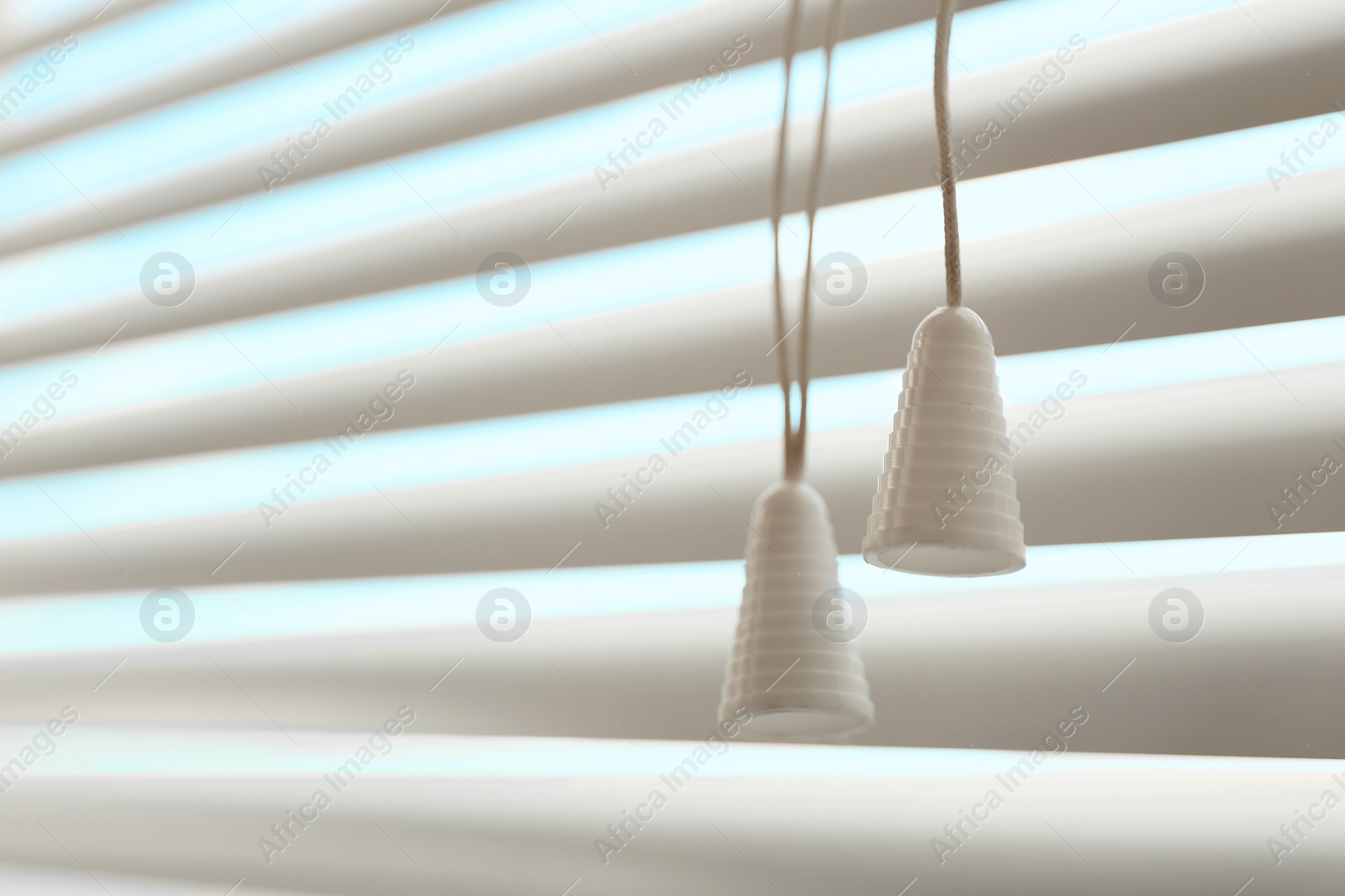 Photo of Closeup view of closed horizontal window blinds