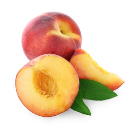 Sweet juicy peaches with leaves on white background