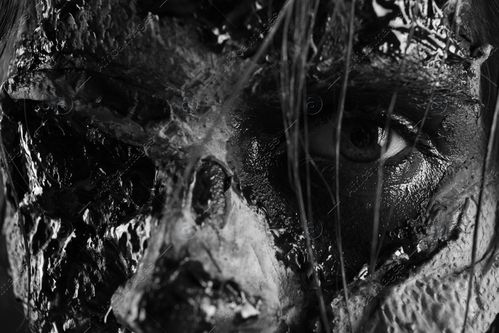 Photo of Closeup view of scary zombie, black and white effect. Halloween monster