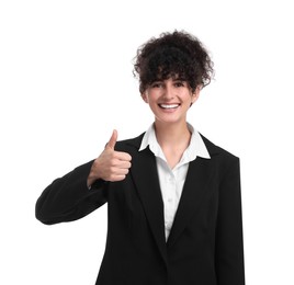 Photo of Beautiful happy businesswoman in suit showing thumbs up on white background