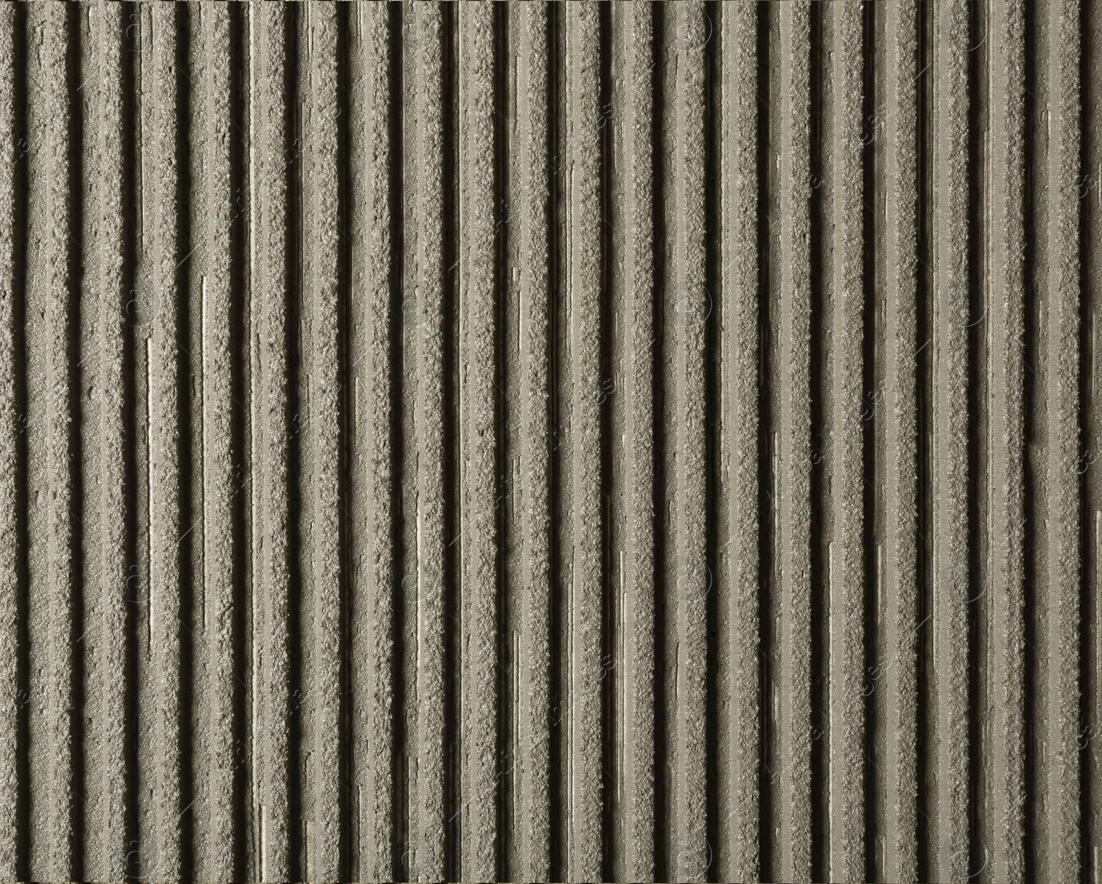 Photo of Lined grey concrete as background, top view. Tile installation