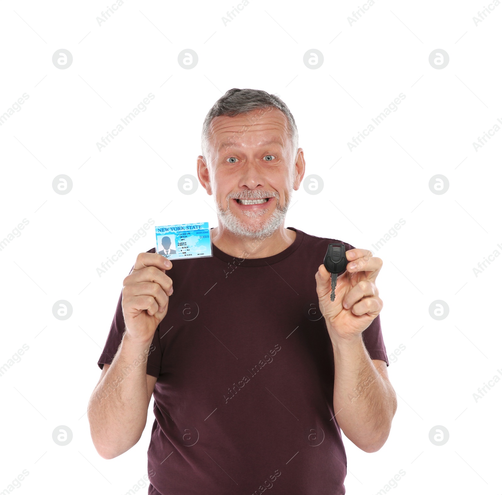 Photo of Happy mature man with driving license and car key on white background