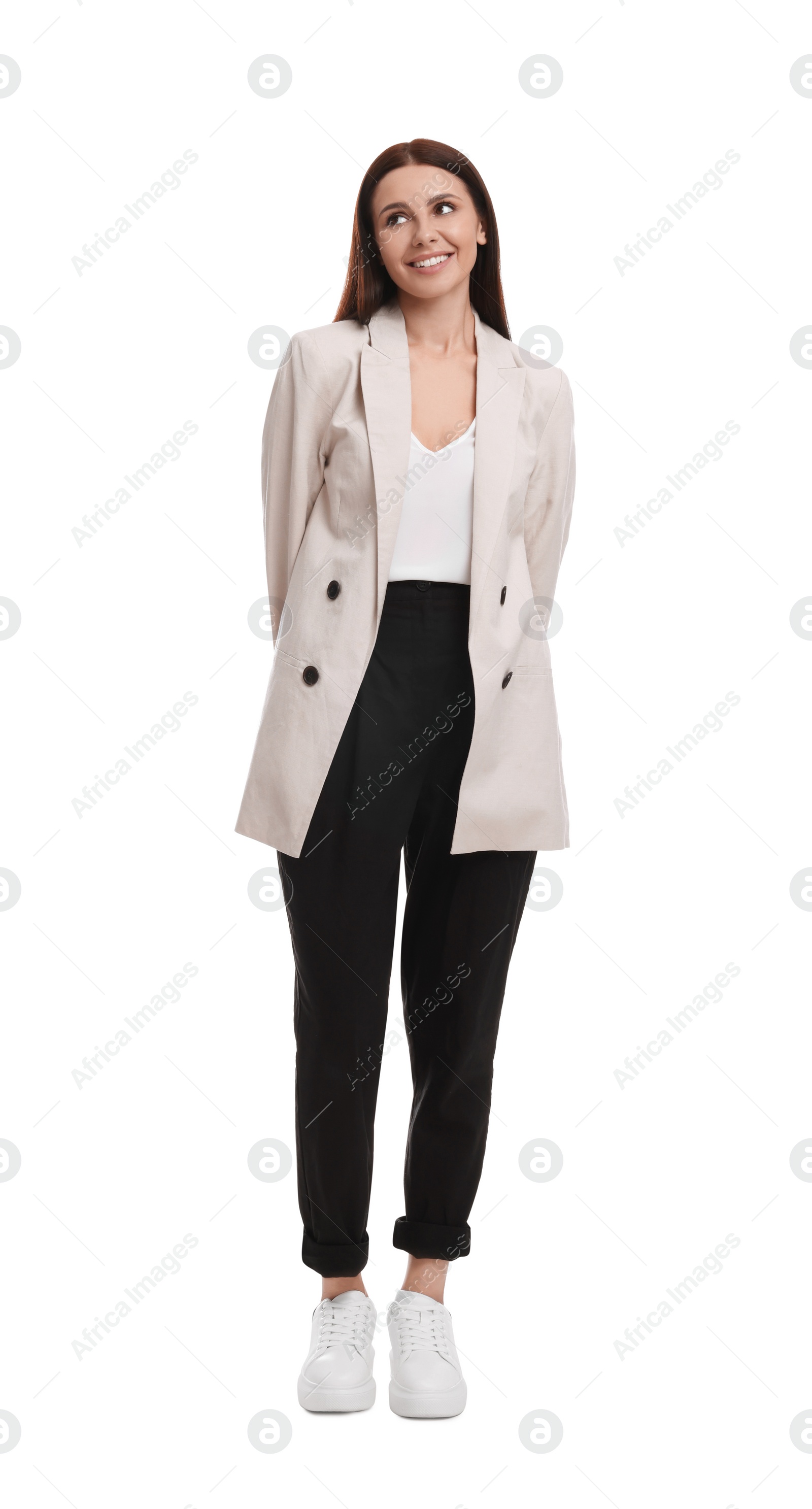 Photo of Beautiful young businesswoman in suit on white background